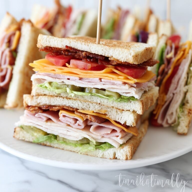 Club Sandwiches with Deli Turkey, Ham, Bacon, and Cheese Recipe